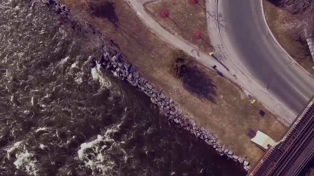 Aerial birds-eye tracking shot of a river.