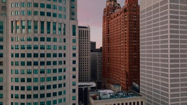 Sweeping drone shot of office buildings