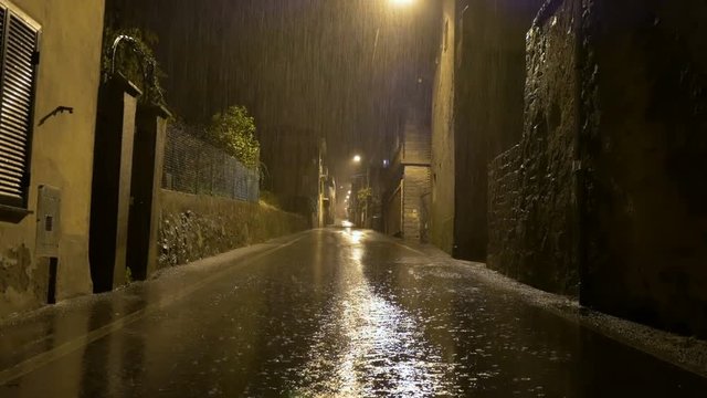 Biella, Italy - April 11, 2018 - Strong night rain in the main street of the country, Tavigliano 