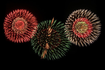 Fototapeta premium Fireworks over night sky background