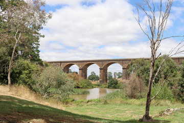 Fototapeta na wymiar the Malmsbury viaduct (1860) is 152 metres long and made of locally sourced bluestone