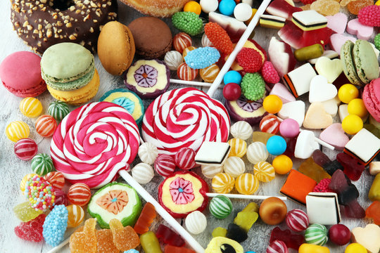 candies with jelly and sugar. colorful array of different childs sweets and treats