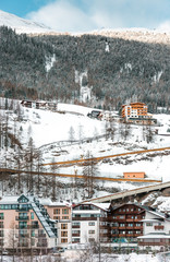 Fototapeta premium The building of hotels and chalets in the ski Alpine resort