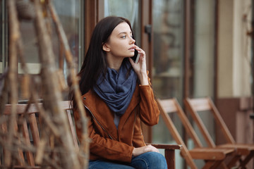 Fototapeta premium Serious brunette listening to her friend