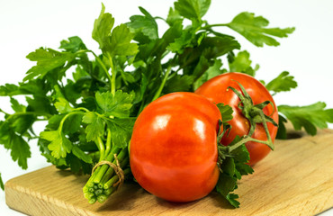 Red fresh tomatoes and fresh herbs