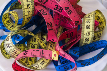 scale and metric tapes . diet and slimming concept
