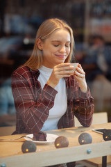 Enigmatical student keeping eyes closed