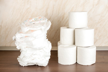 diapers and toilet paper, the concept of the baby's transition from diapers to toilet