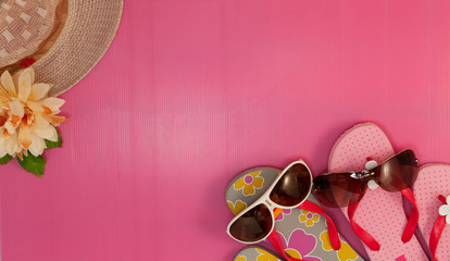 Summer background, set of summer accessories on pink background