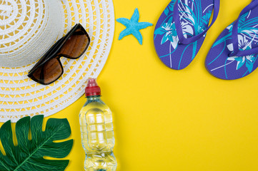 Top view of beach summer accessories with copy space. Traveler accessories. Summer background. Summer beach vacation concept. Flat lay, top view.