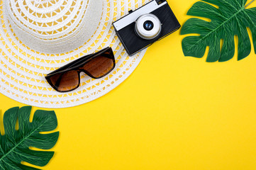 Top view of beach summer accessories with copy space. Traveler accessories. Summer background. Summer beach vacation concept. Flat lay, top view.