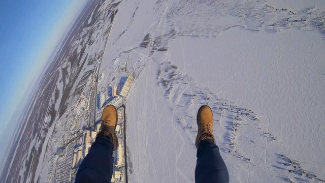 Peaceful landscape with parachuters