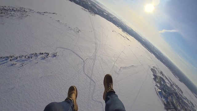 Peaceful landscape with parachuters