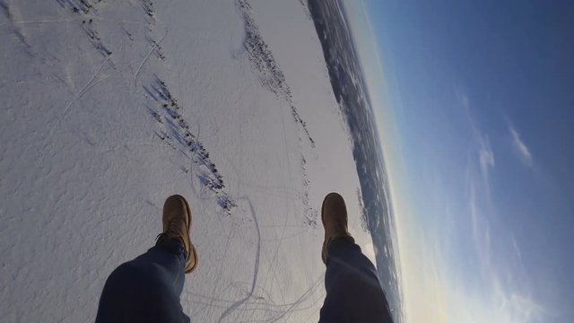 Peaceful landscape with parachuters