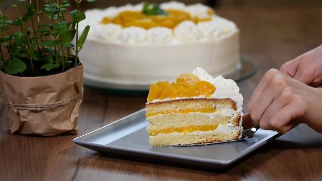 Put a piece of peach cake in a plate
