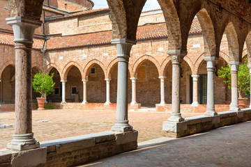 Fototapeta na wymiar Interior on old brick house with columns in Venice, Italy