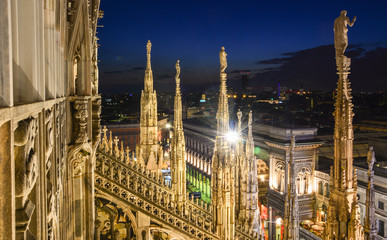 Gothic spires of Milan Cathedral at night, Milan, Italy