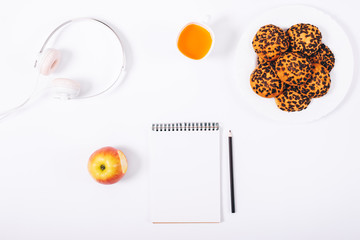 Top view on white background blank notepad