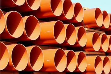 The warehouse of industrial plastic pipes and large diameter hoses. Products from plastic. Drainage...