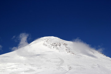 Winter landscape with snow-capped peaks of the Caucasus mountains, the highest peak in Europe-mount Elbrus, Russia