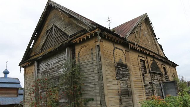 Abandoned old wooden Russian Orthodox Church. Wooden Church after partial fire
