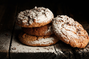 Oats cookies over black background