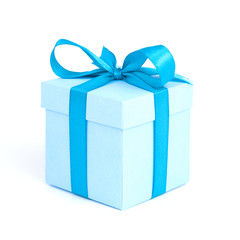 A blue gift box with blue ribbon isolated on white background the image for christmas and new year's day