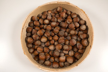 Hazelnuts in a wicker basket.