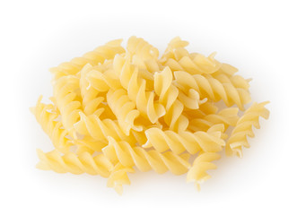 Heap of fusilli pasta isolated on white background with clipping path