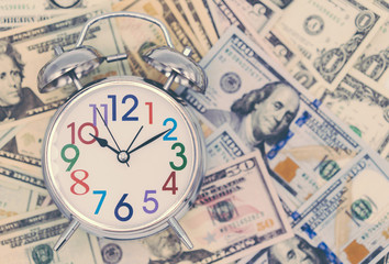 Dollar currency, American Dollars Cash Money with Alarm Clock.