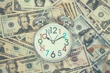 Dollar currency, American Dollars Cash Money with Alarm Clock.