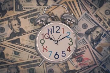 Dollar currency, American Dollars Cash Money with Alarm Clock.