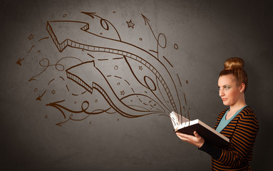 Casual young woman holding book with brown arrows and stars flying out of it