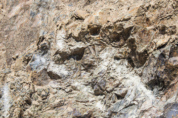 Geologic rock background composition full of veins