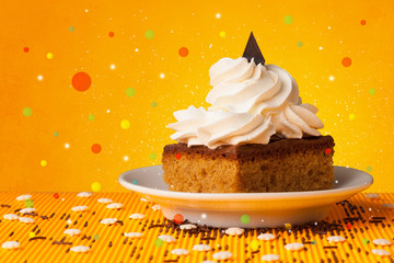 Close up of sweet tasty cakes with colorful background and bokeh light