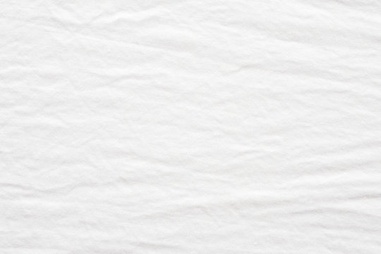 Fototapeta Wrinkled white cotton fabric textured background, Fashion pattern textile design concept background