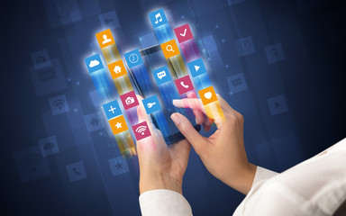 Female hand using smartphone with colorful angular fast switching application icons around