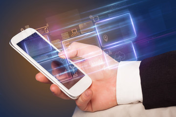 Hand using  phone with database reports and online work concept
