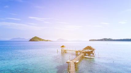 Restaurant on wooden bridge stretched into the sea at Koh Mak, Trat, Thailand