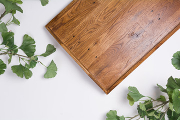 Wooden Tray with Branches Flat Lay Top View