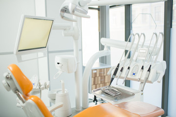 Dentistry equipment and comfortable armchair for patients in contemporary dental clinics