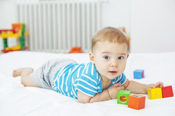 Baby boy playing at home