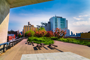 Manhattan, New York City - June 14, 2017: The High Line Park in Manhattan New York. The urban park is popular by locals and tourists built on the elevated train tracks above Tenth Ave in New York City