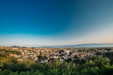 Fototapeta premium Kutaisi, Georgia. Cityscape In Sunny Autumn Evening