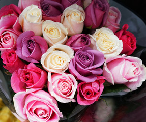 close up on colorful rose in a bouquet