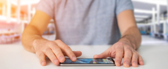 Businessman using modern mobile phone