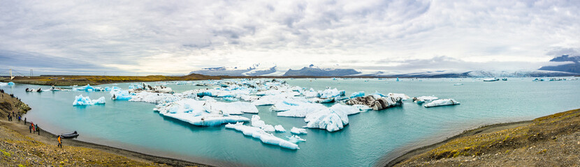 Big blue icebergs at glacier lagoon on Iceland