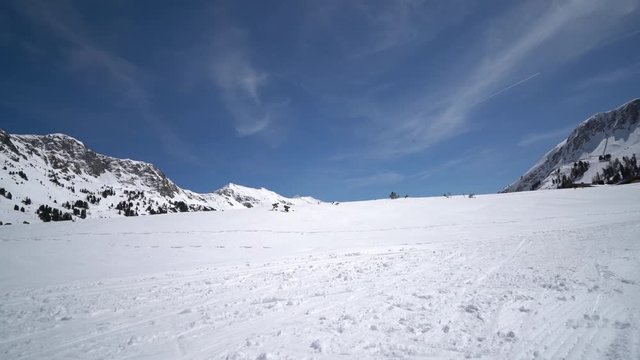 4k winter sport video one man cross country skiing on trail in mountains
