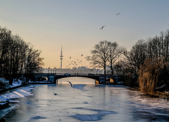 winter in Hamburg, Germany; sunset in the coast; bridge 