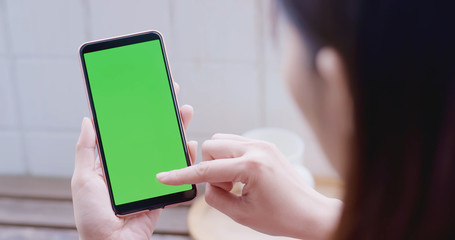 woman take cell phone